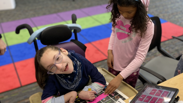 High Point and Honey Creek students work together on an art project.