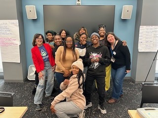 Group of women smiling and posing